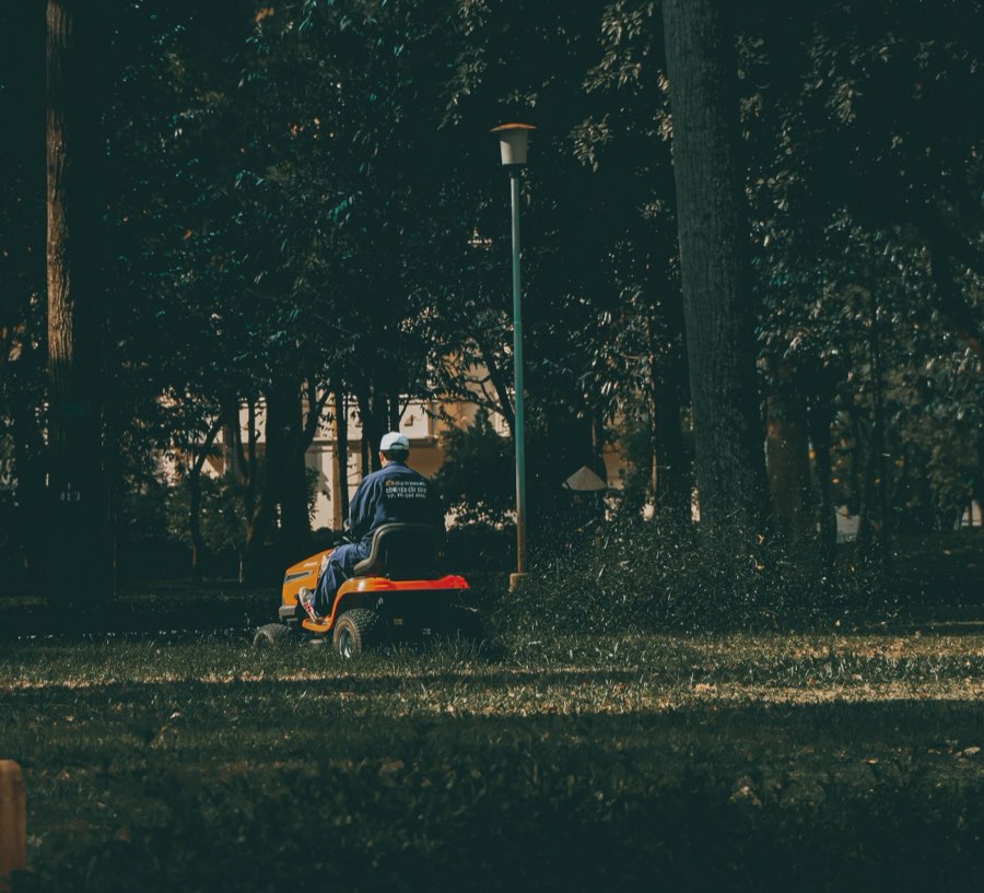 Crew mowing a large lawn